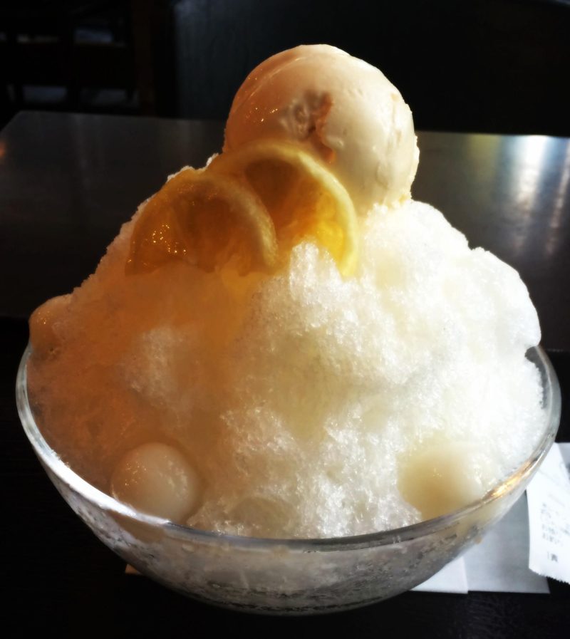 Photo of a bowel of lemon ice. Cafes are great to stop and refresh and look up answers to your Japan travel questions.